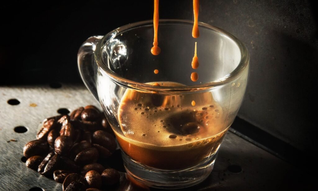 italian espresso pouring into a cup