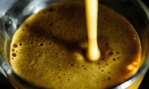 Freshly brewed Italian espresso showing smooth crema texture